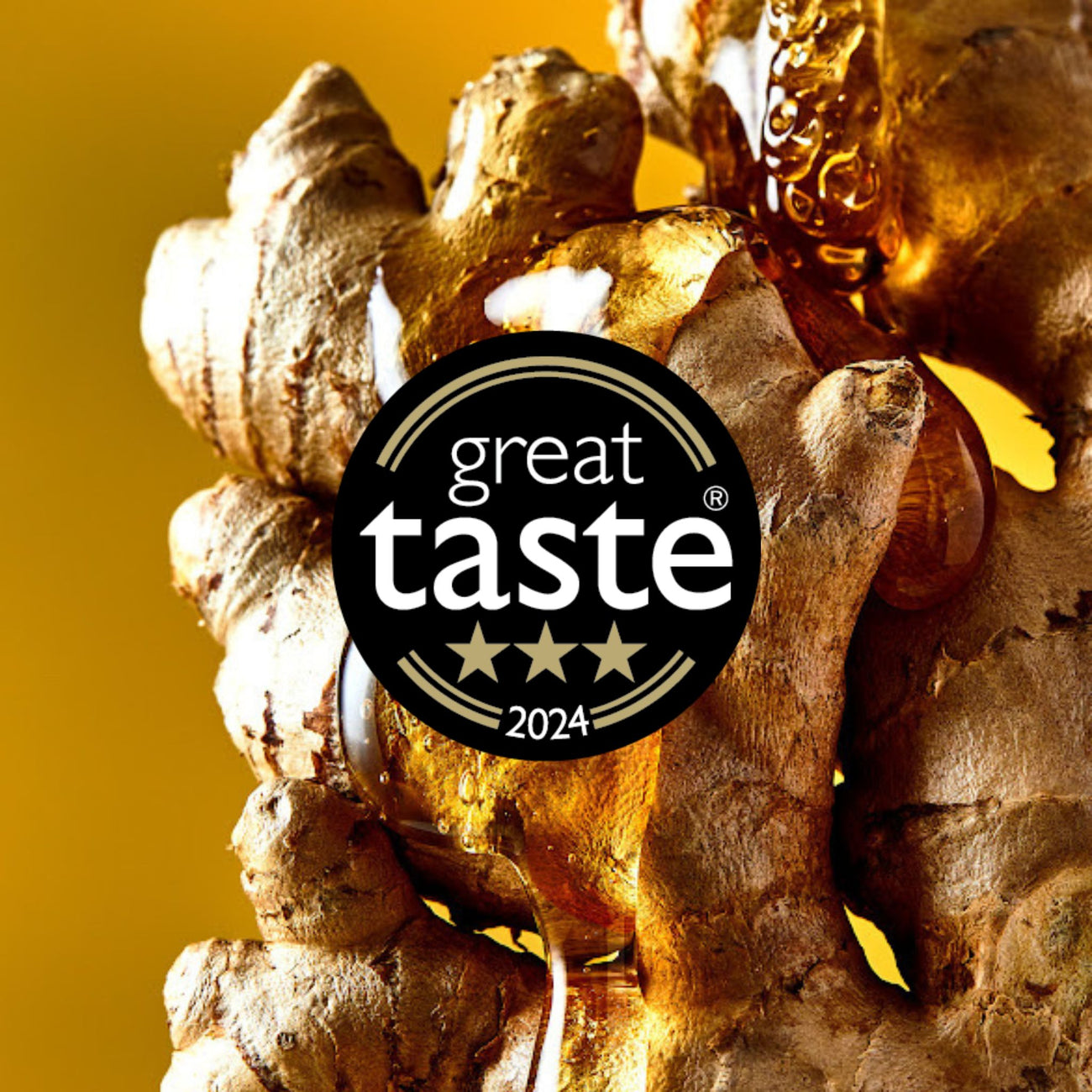 Close-up of Mother Root Ginger, blossom honey, and a Great Taste 2024 award badge in the center.