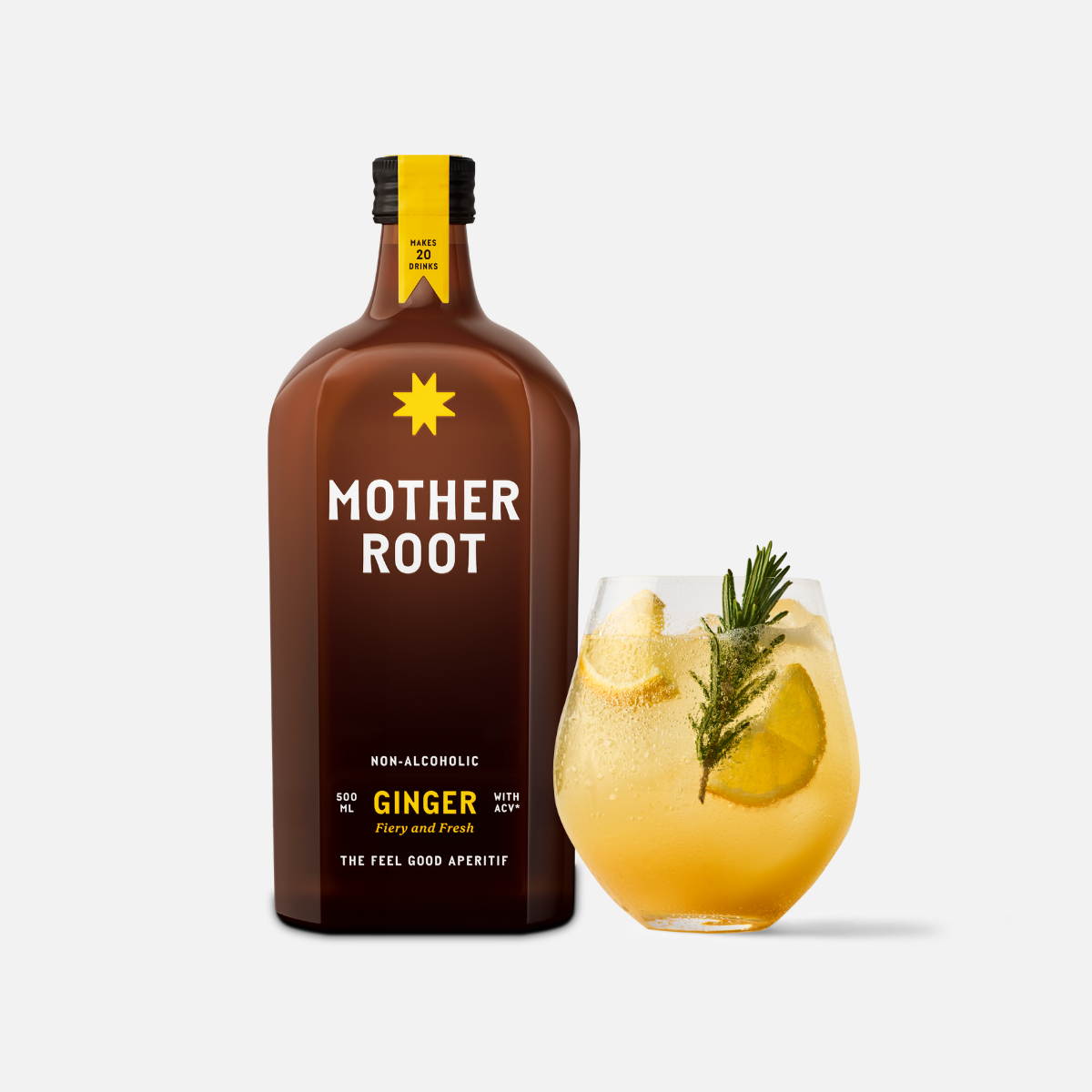 A bottle of Mother Root Ginger by Mother Root sits beside a glass of golden drink with ice, lemon slices, rosemary, and hints of blossom honey and apple cider vinegar on a white background.