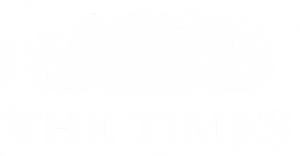 The Times newspaper logo features a lion unicorn and crown above the text THE TIMES in classic style.